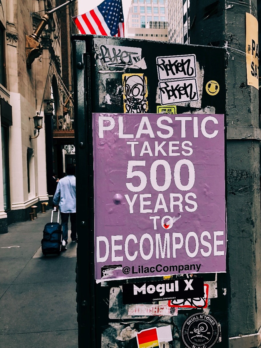 Street art with the words plastic takes 500 years to decompose