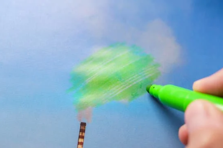 Greenwashing image of smoke stacks being drawn green