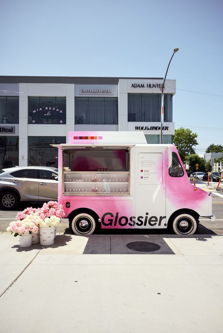 Glossier flower pop up truck