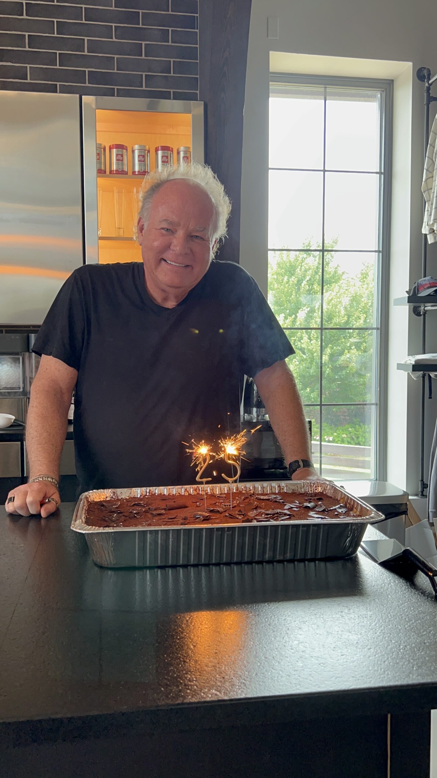 Bret, CEO of Stars Design Group with our 25th Birthday Cake